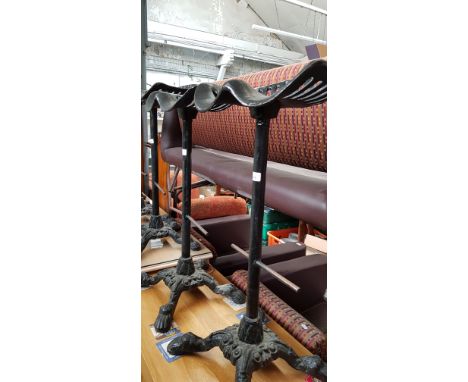 A pair of cast iron tractor seat bar stools, height 82cm (overall).  