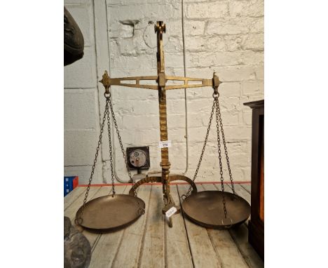 A set of antique brass balance scales  