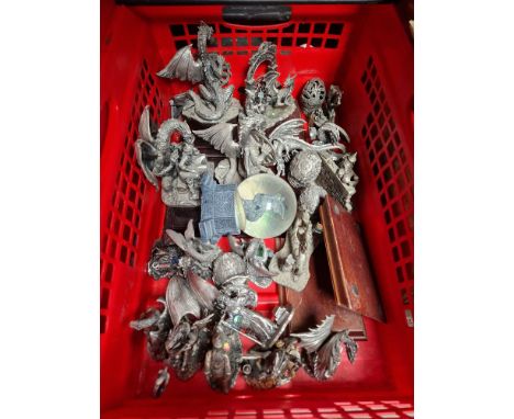 A box of Myth and Magic pewter dragon figures.  