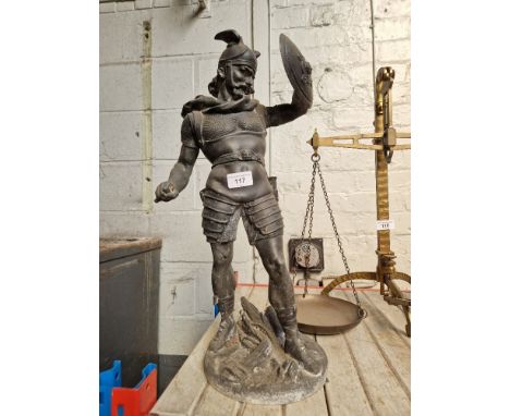 A spelter figure, medieval warrior signed DetrierOriginal figure was holding a dagger but this has been broken off at some po