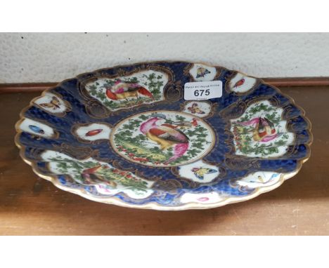 A Worcester late 18th century porcelain plate decorated in exotic birds, possibly in the workshop of James Giles, pseudo Chin