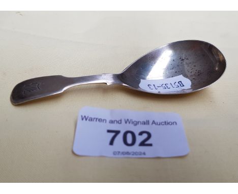 A Georgian silver caddy spoon.  