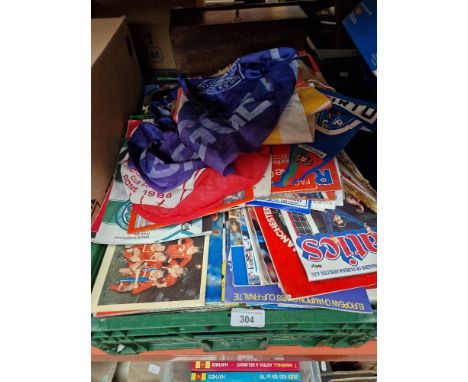 A box of assorted football programs to include United review, Euroean cup final 1978, Liverpool flags, hat and scarf etc. & o
