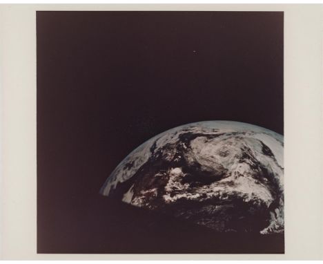 Neil ArmstrongThe receding disc of Earth after translunar injection, very rare photograph unpublished after the mission, Apol