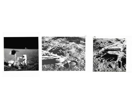 Pete ConradA set of three views from the inspection of Surveyor 3, comprising a photograph of Pete Conrad inspecting the TV c