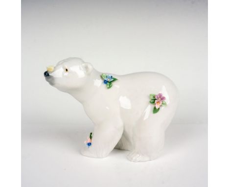 Glossy finish; charming white bear on all fours adorned with flowers on the body and a butterfly sitting on its nose. Lladro 