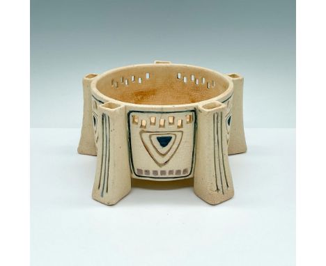 Plant display with cream-colored reticulated planter. Handcrafted and adorned with bud-style openings around a central bowl a