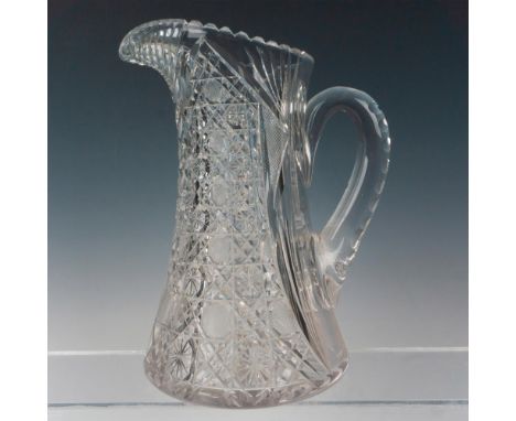 Very elegant and heavy weight clear crystal pitcher finely crafted by artisans with brilliant and precise patterns throughout