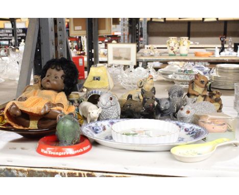 A QUANTITY OF RECONSTITUTED STONE ANIMALS, CERAMIC ANIMALS, A VINTAGE CHILTERN DOLL, ETC 