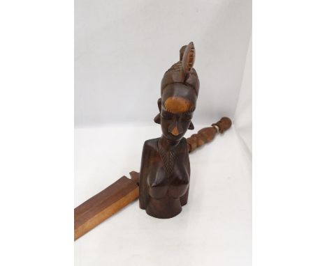AN AFRICAN CARVED WOODEN SCULPTURE OF A WOMAN'S HEAD PLUS A WOODEN AFRICAN STICK 