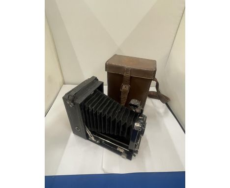 A VINTAGE FOLD OUT CAMERA WITH CASE 