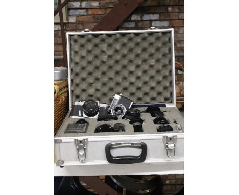 A YASHICA MINISTER III AND A CHINON CS CAMERA WITH LENSES AND ACCESSORIES IN AN ALUMINIUM CASE 