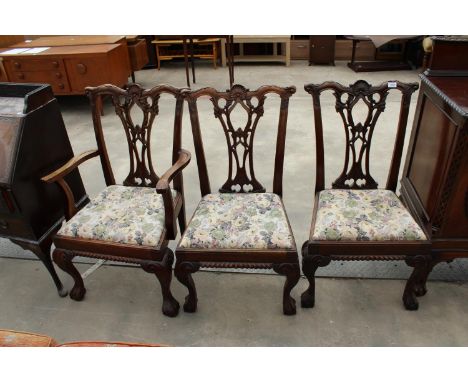A PAIR OF MAHOGANY CHIPPENDALE STYLE DINING CHAIRS AND MATCHING CARVER CHAIR 