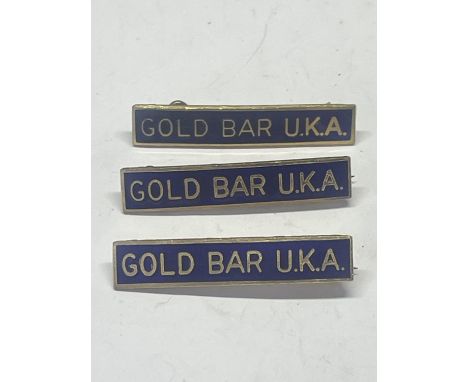 THREE BLUE ENAMEL GOLD BAR U.K.A BADGES FORM THE 1970'S 