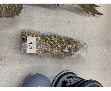 A BAG CONTAINING VINTAGE NECK CHAINS 