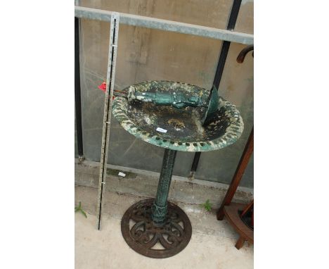 A VINTAGE CAST ALLOY BIRDBATH WITH CAST IRON BASE AND A FURTHER CAST ALLOY GARDEN FIGURE 