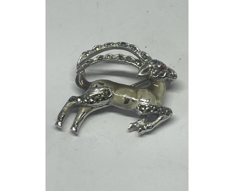 A VINTAGE ENAMEL AND MARCASITE GAZELLE BROOCH 