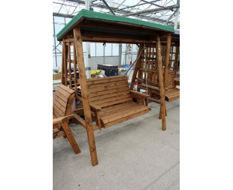 AN AS NEW EX DISPLAY CHARLES TAYLOR TWO SEATER SWING SEAT GARDEN ARBOUR, WITH CANOPY *PLEASE NOTE VAT TO BE ADDED TO THE HAMM
