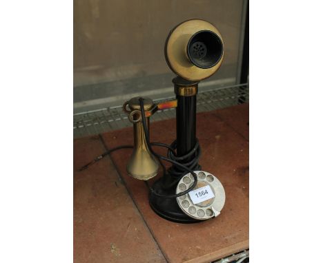 A VINTAGE BRASS ROTARY DIAL STICK TELEPHONE 