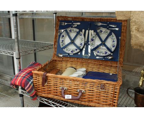A WICKER OPTIMA PICNIC HAMPER COMPLETE WITH PICNIC ITEMS 