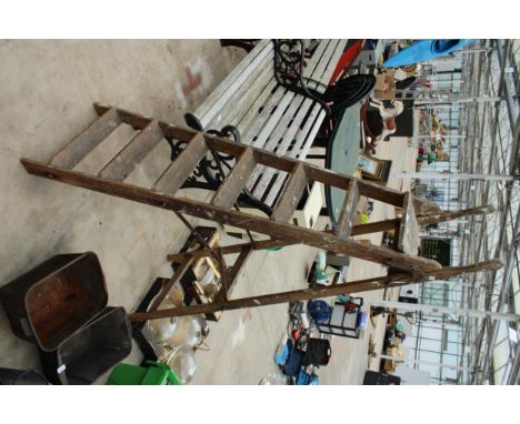 A VINTAGE SIX RUNG WOODEN STEP LADDER 
