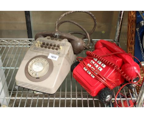 A RETRO ROTARY DIAL TELEPHONE AND A FURTHER PUSH BUTTON PHONE 