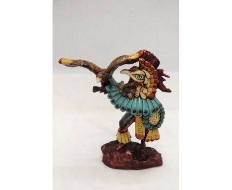 AN AZTEC FIGURE WITH SEMI-PRECIOUS STONES 