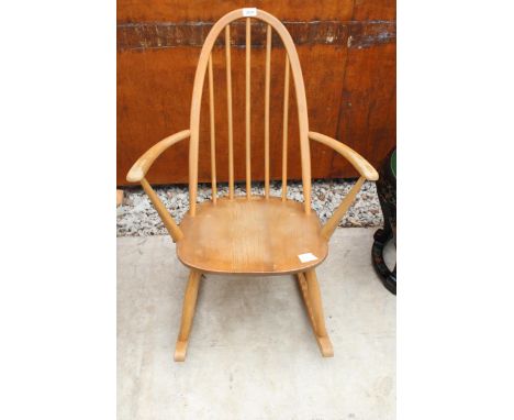 AN ERCOL BLUE LABEL ELM AND BEECH ROCKING CHAIR 
