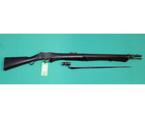 A Martini Henry Mk II rifle, lock marked crown over V.R. Enfield 1876 II, stock also marked Enfield II, this is a fine exampl