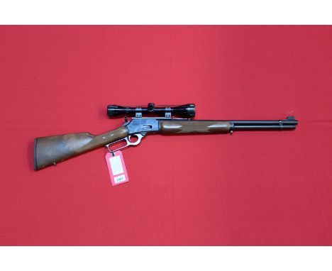A Marlin model 18945 lever action rifle in .44 cal, S/No.04091266, 20" barrel and extension to hammer, a Bushnell scope also 