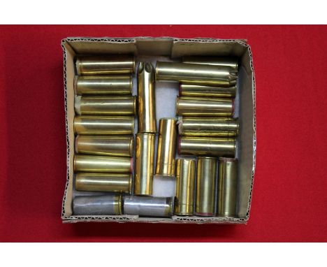 A collection of twenty one various brass and alloy 12 bore shotgun cartridges including J Purdey &amp; Sons examples, this it