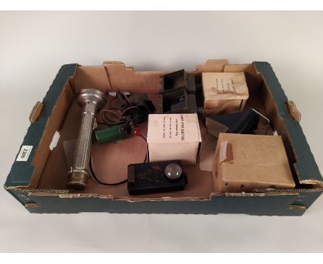 A collection of mainly military related torches including A.R.P. (helmet and hooded) examples, life jacket lamp etc, ten in t