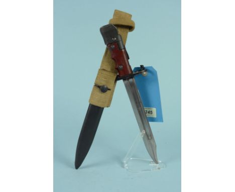 A British No.7 'knife bayonet' with scabbard and 1942 dated frog