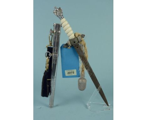 A Third Reich era Kriegsmarine (Administration) model dress dagger with scabbard, one hanging strap and portepee knot (N.B. t