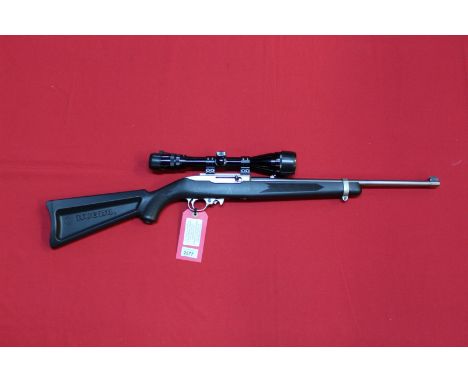 A .22 rim fire cal Ruger model 10/22 synthetic stock carbine, complete with Niko Stirling 4-12x40 scope, this now classic rif