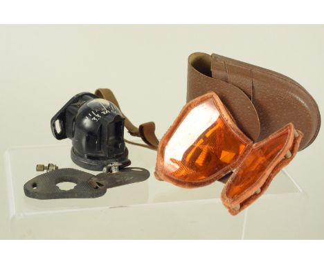 A type E2A floating compass (Mod B-136) with a pair of goggles