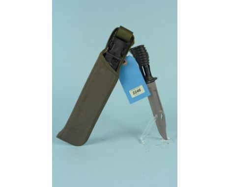 A British S.A.80 bayonet with scabbard and canvas carry case