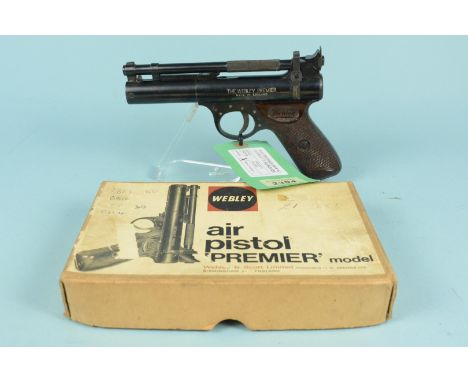 A Webley &amp; Scott 'Premier' .22 cal air pistol (E Series Batch No.172) with brown grips in original box with paperwork, as