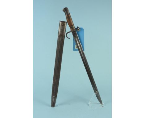 A British model 1907 bayonet (with hooked quillon) complete with scabbard, this example by Enfield dated 11/08 with unit mark
