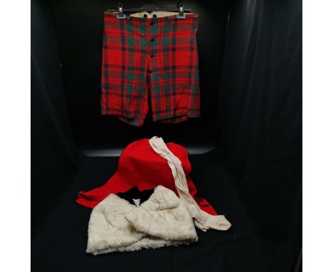 Tartan shorts, scarf, ermine bolster &amp; silk stockings. 