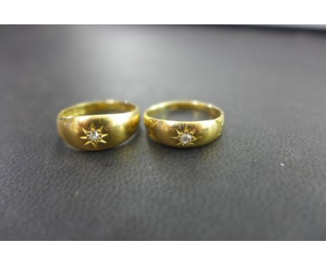 Two rings with old-cut diamond highlights - Both with marks indicating 18ct gold - Ring size L - Weight approx 5.1gms
Conditi