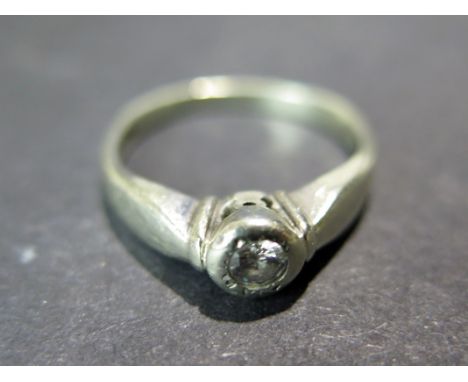 A 9ct white gold solitaire diamond ring - Size N - Diameter of diamond approx. 3mm - Weight approx. 2.7gms 
Condition report: