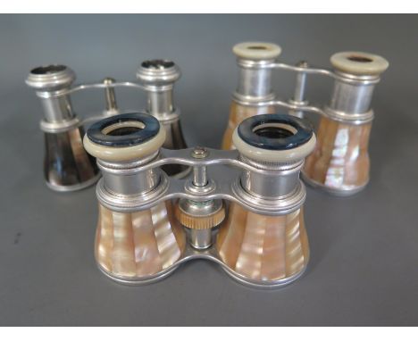 Three pairs of mother of pearl opera glasses - all working, some usage wear consistent with age