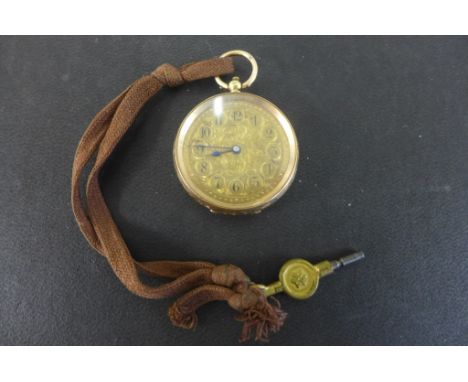 An early 20th century Continental fob watch having engine turned foliate decorated dial with telephone dial, Roman numerals a