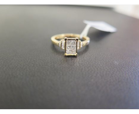 A 9ct gold diamond dress ring - The princess-cut diamond panel to the brilliant-cut diamond shoulders and plain band - Accomp