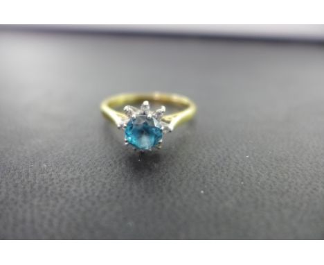 A zircon and diamond cluster ring - Stamped 18ct - Ring size Q - Weight approx 3.4gms
Condition Report: Good - With light sur