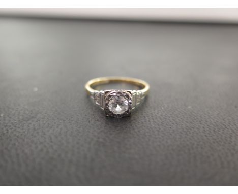 A zircon single-stone ring - Stamped 18ct Palladium - Ring size L 1/2 - Weight approx 3.0gms
Condition Report: Fair - With li