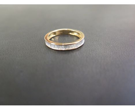 A 9ct gold baguette-cut diamond half-circle ring - Hallmarked Birmingham - Ring size N 1/2 - Weight approx 2.1gms
Condition R