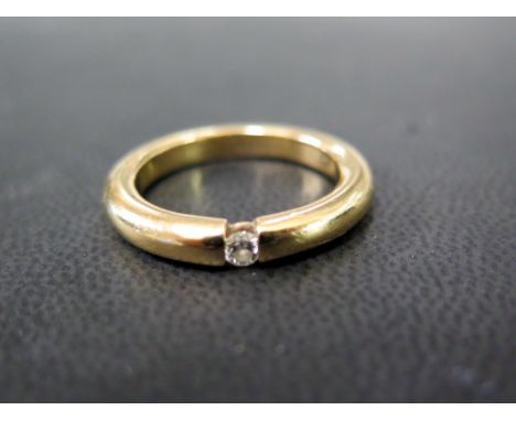 A tension-set brilliant-cut diamond band ring - With marks indicating 18ct gold - Ring size P - Weight approx 8.1gms
Conditio