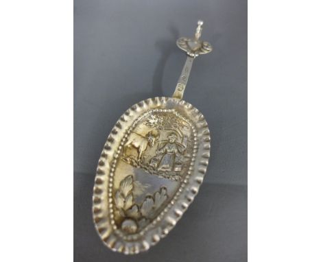 A 19th century style Dutch caddy spoon with highly embossed bowl - approx weight 0.72 troy oz - 13cm - good condition